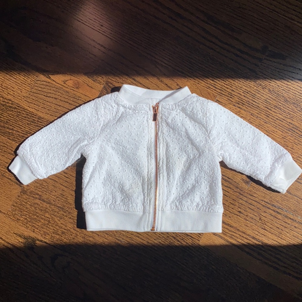 Eyelet bomber jacket